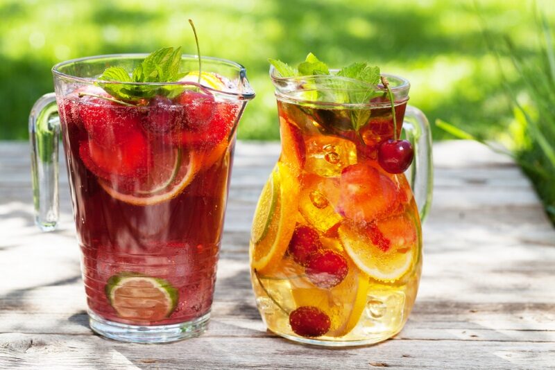 homemade-lemonade-or-sangria-with-summer-fruits-and-berries-outdoor